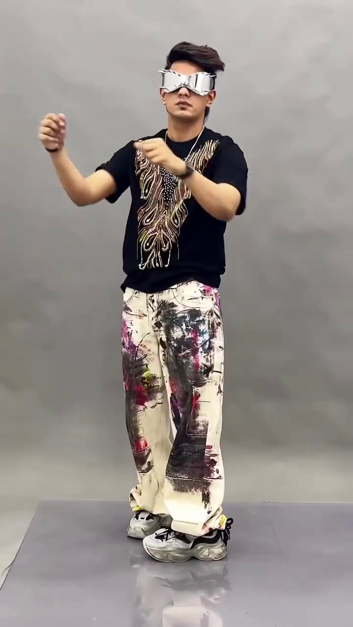 Bold Streetwear Look with Graphic Tee and Artistic Pants