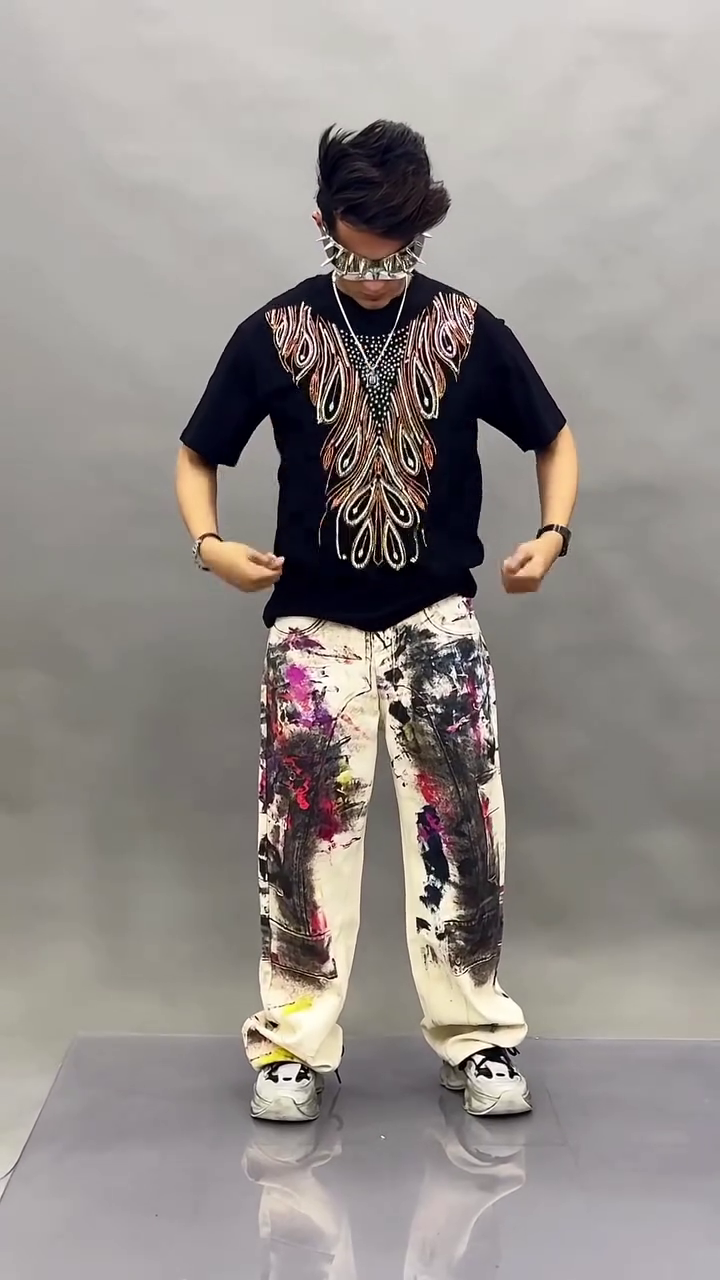 Bold Streetwear Look with Graphic Tee and Artistic Pants